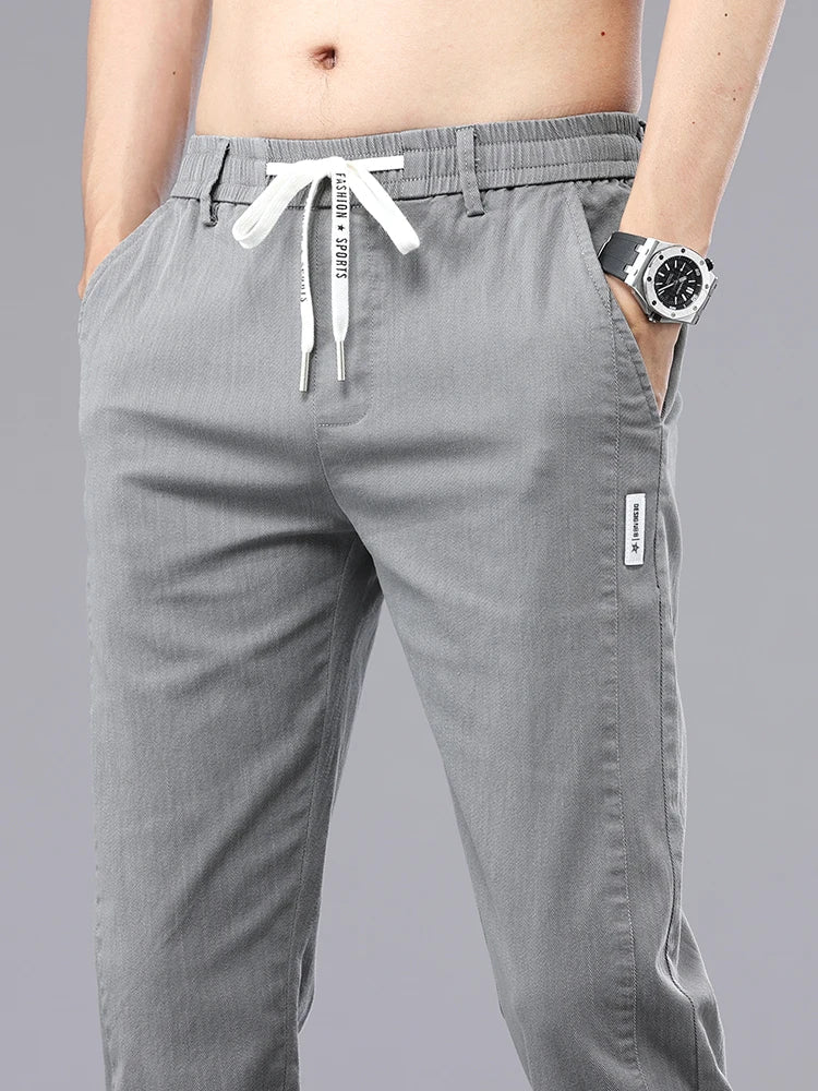 Brand Clothing Men's Casual Pants Spring Summer Thin Cotton Elastic Waist Design Jogging Trousers Solid Korean Men Sweatpants